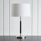 MODERN BRASS AND LEATHER TABLE LAMP